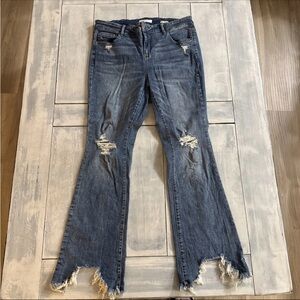 High-Rise Distressed Flare Jeans in Dark Blue